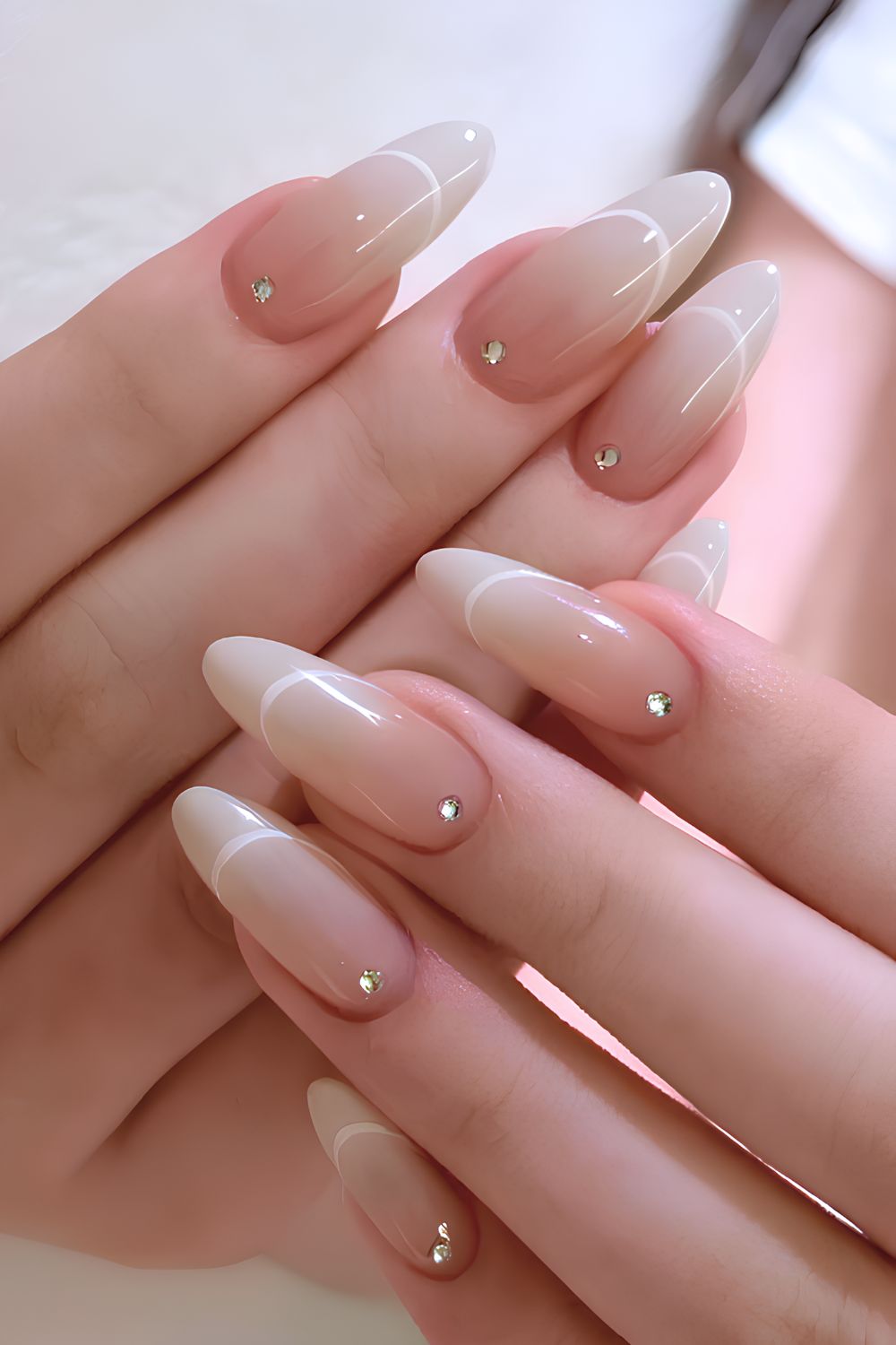 White ombre mani with gems and French tip outlines