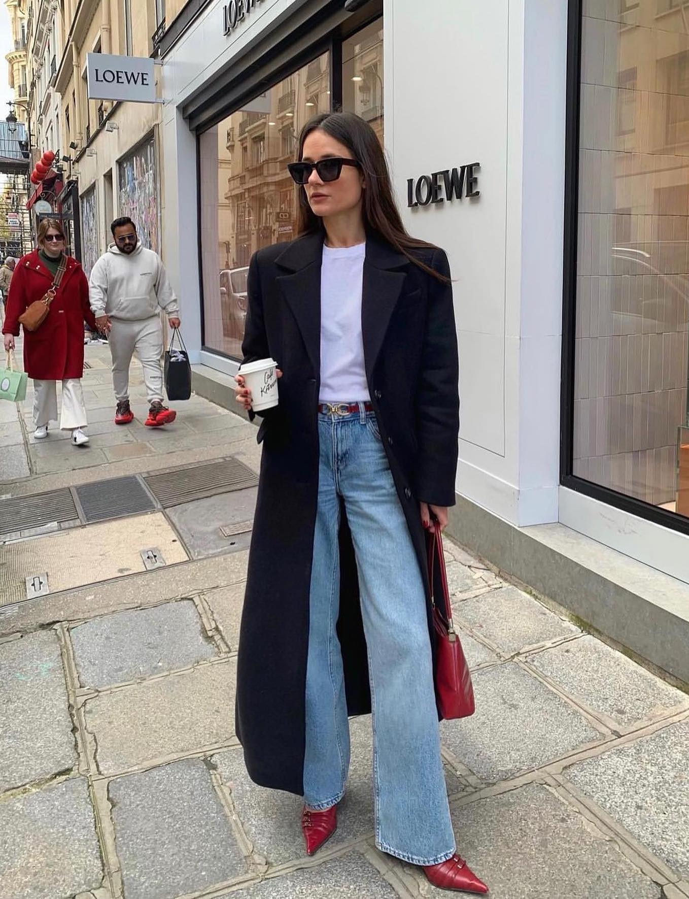 Casual fall outfit with flared jeans and cherry red boots