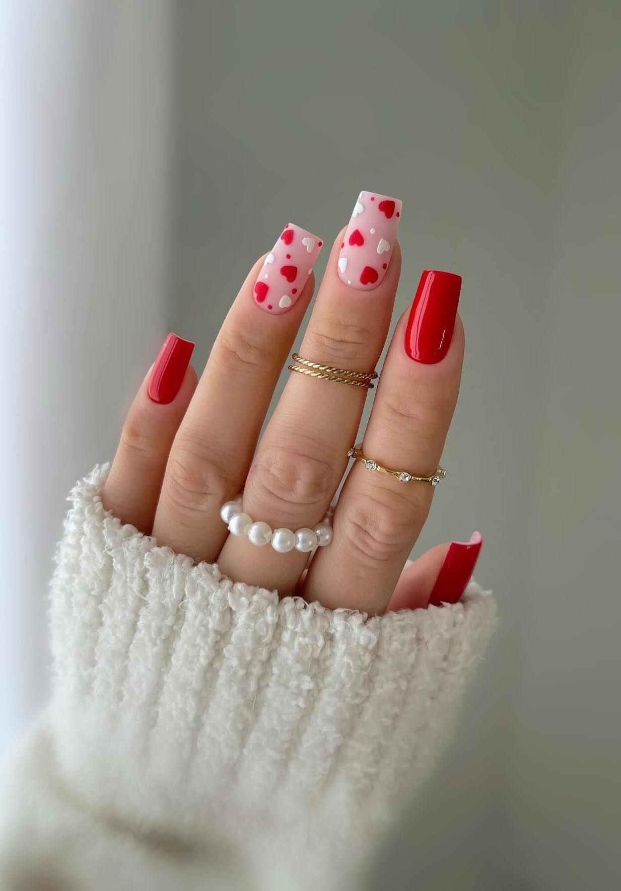 Red Valentines Day nails with hearts