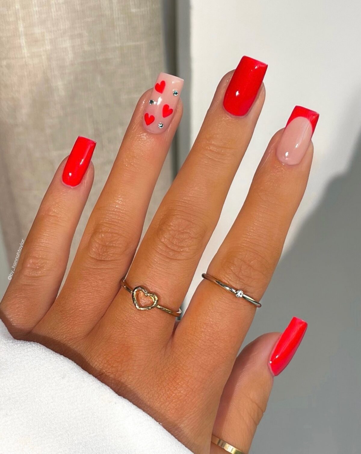 Red Valentines Day nails with hearts