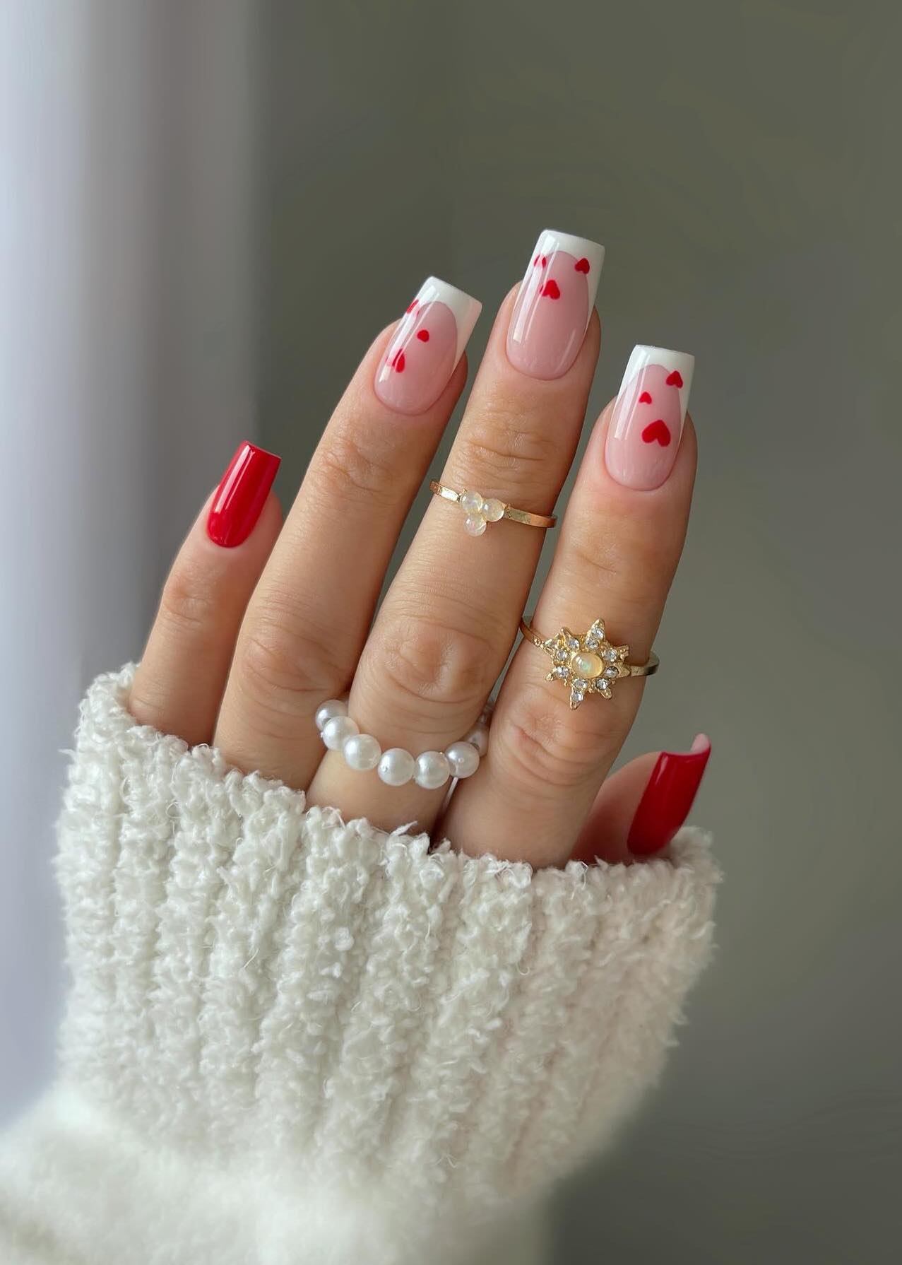 French tip nails with hearts