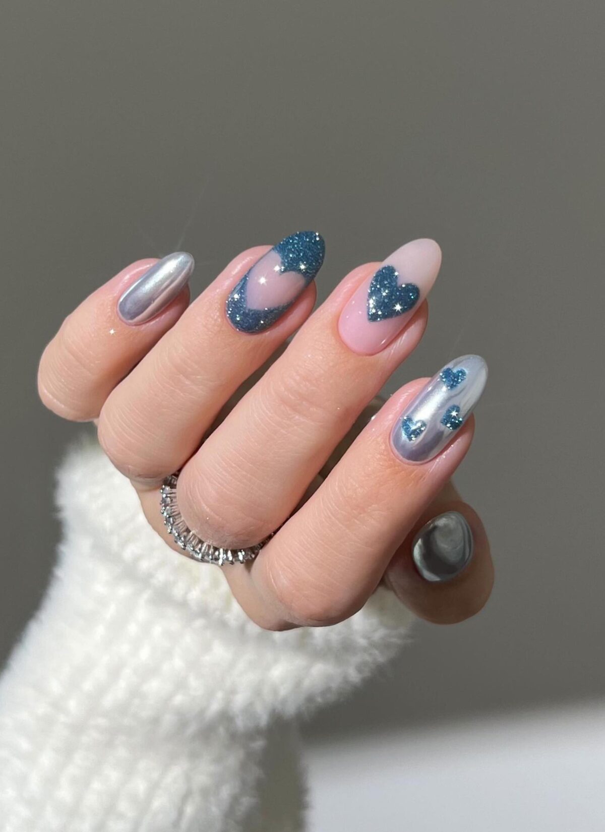 Blue chrome nails with hearts