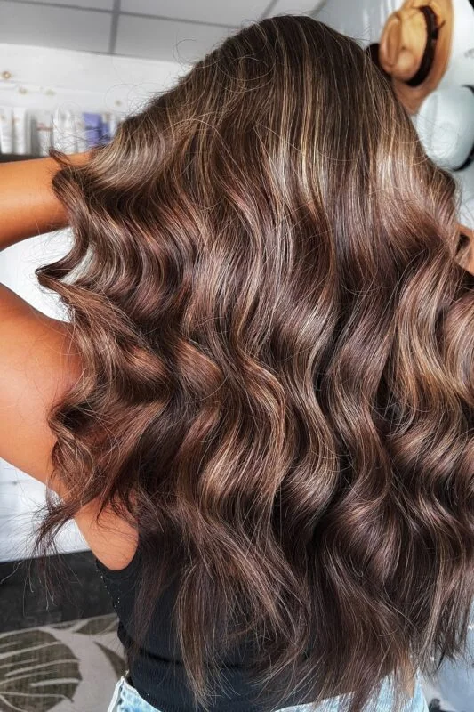 Woman with honey brown hair.