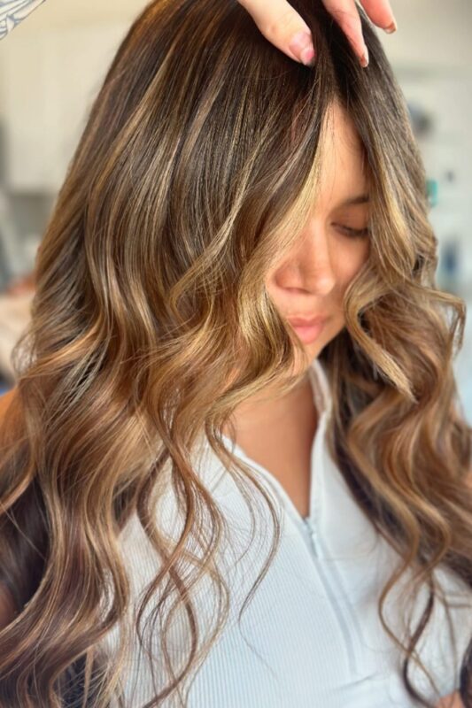 Woman with a light golden brown hair color.