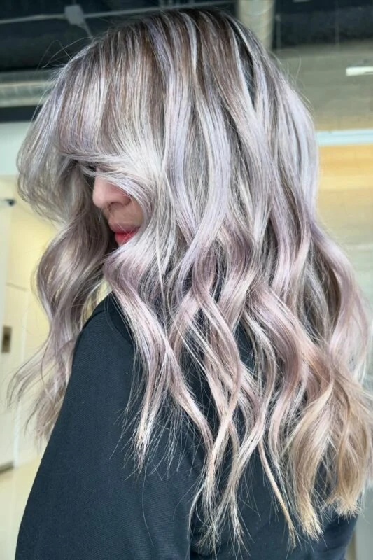 Woman with a silver balayage.