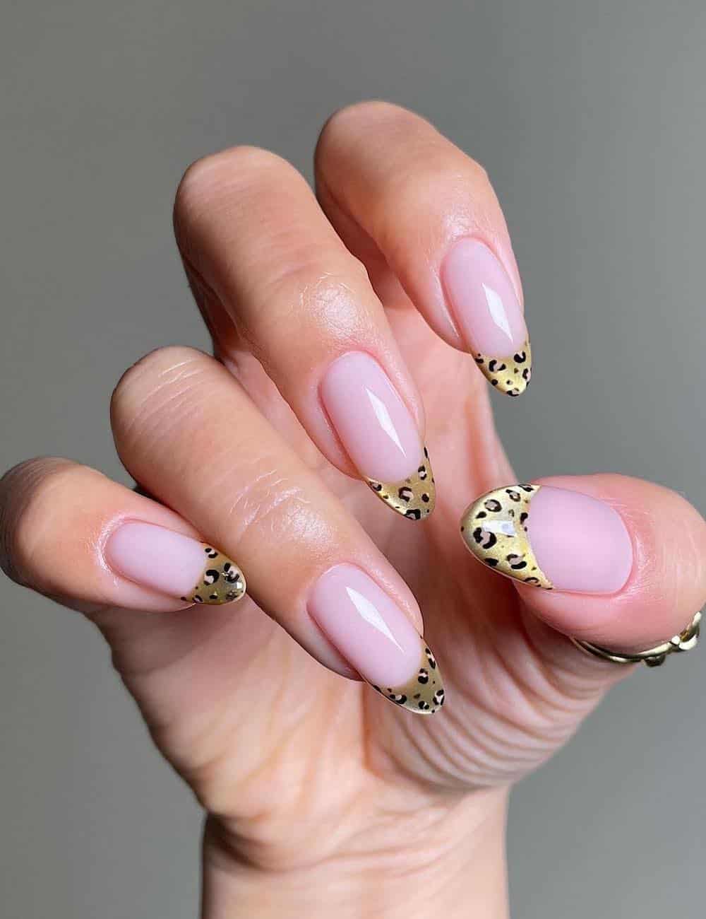 long nude almond nails with velvety animal print tips