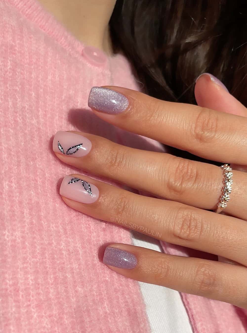 short square nails with velvet purple nails and nude accent nails with butterfly art