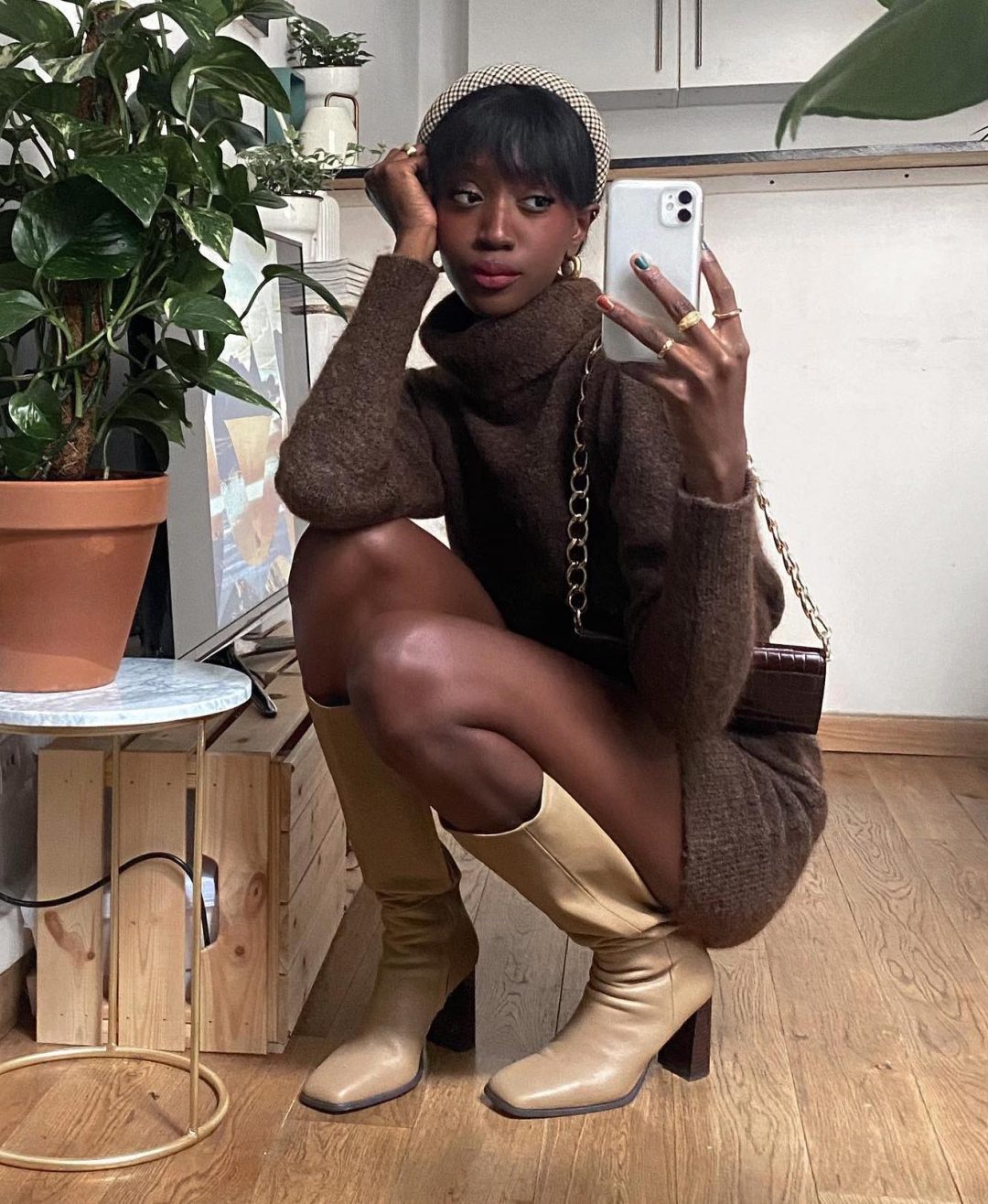 Brown sweater dress outfit with beige boots