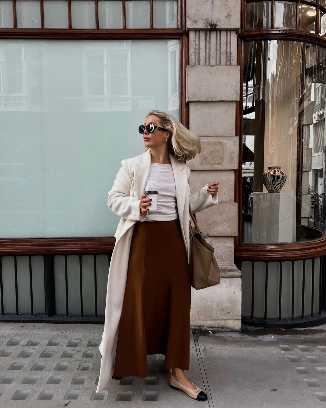 Chic Thanksgiving outfit with brown satin skirt