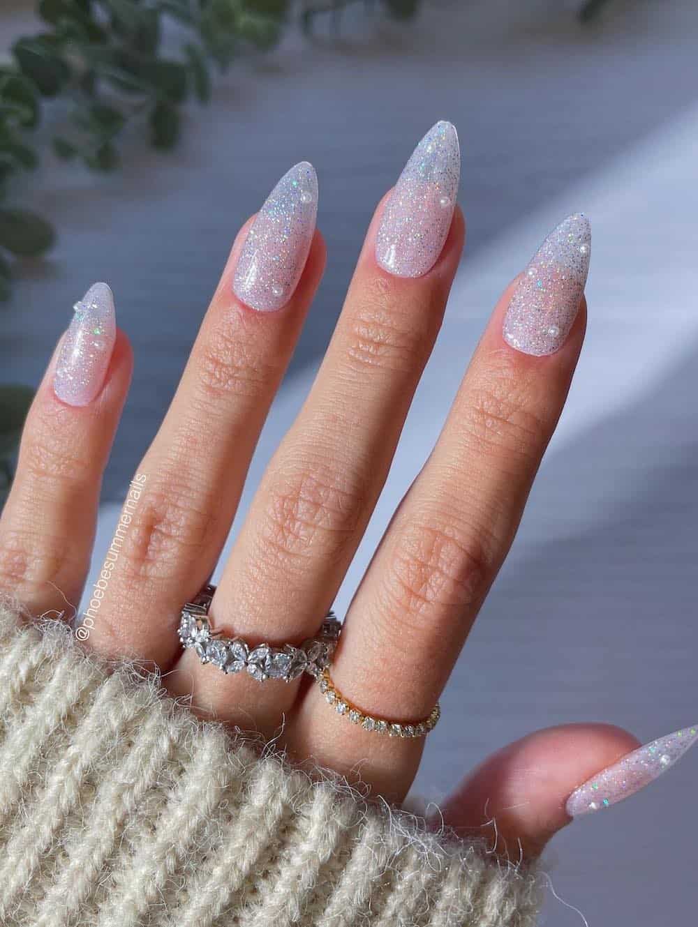 shimmering almond nails with pearls